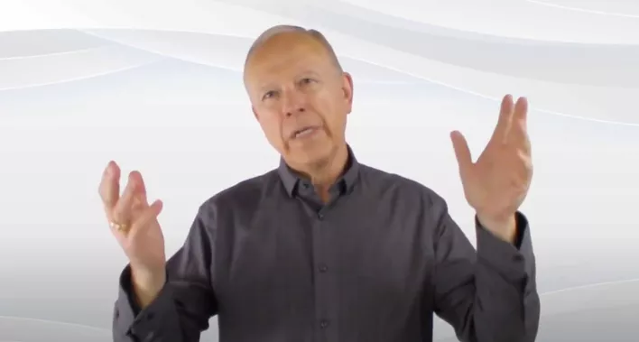 Rob Johnstone providing expert real estate advice on camera, discussing Calgary market trends and home buying tips.