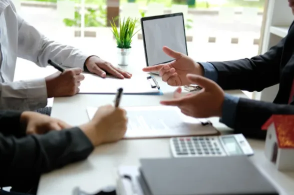 Marketing Your Home Realtor a clients signing a deal